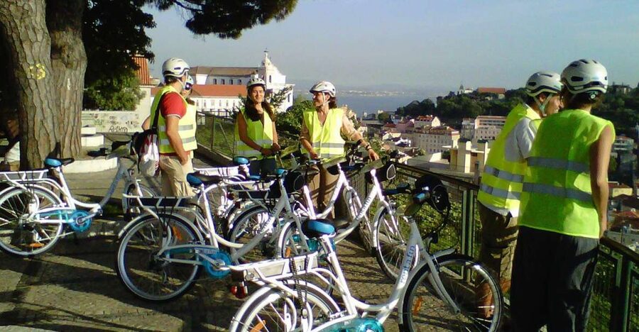 Lisbon: 7 Hills Half-Day Electric Bike Tour - Feira da Ladra to Panteão Nacional: start with an easy history warm-up