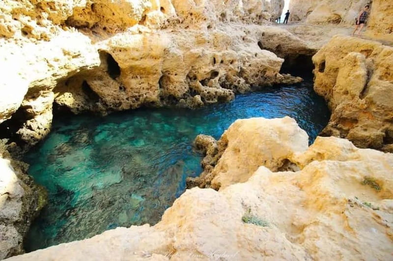 Lisbon: Algarve, Benagil Cave, Carvoeiro & Lagos Day Trip - Praia Dona Ana and Praia do Camilo: pick your comfort, then soak up the views