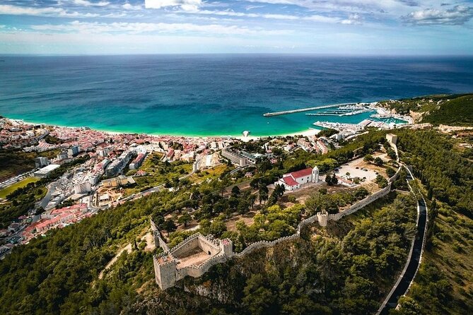 Lisbon: Arrábida & Sesimbra Tour – Wine, Nature & Beaches - Stop 6: Portinho da Arrábida for quiet water and mountain framing