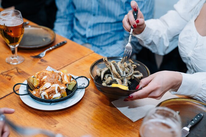 Lisbon: Award-Winning Guided Walking Food Tour with Local Drinks - Rua dos Fanqueiros: Petiscos, Chouriço, and Codfish Comfort