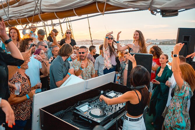Lisbon Boat Party BIGGEST Sunset Cruise — with Music & Drinks - DJ music on the Tagus: deep house, reggaeton, and mainstream hits