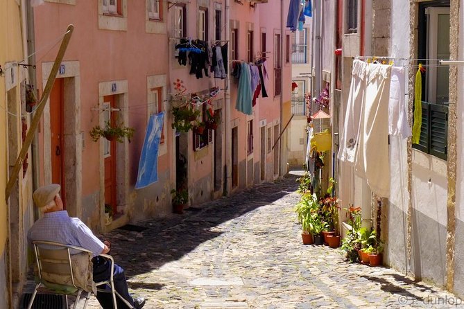 Lisbon by Night Tour: Fado Show and Dinner with Pick-up - Alfama, Bairro Alto, and Mouraria: the Fado streets you’ll walk