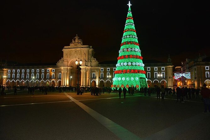 Lisbon Christmas Lights Tuk-Tuk Tour with Local Guide - Camoes Square and the Disney-palace-style installation