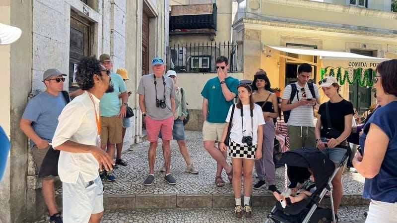 Lisbon: City Highlights Guided Walking Tour - Santa Justa Elevator and Rossio: moving from monuments to everyday Lisbon