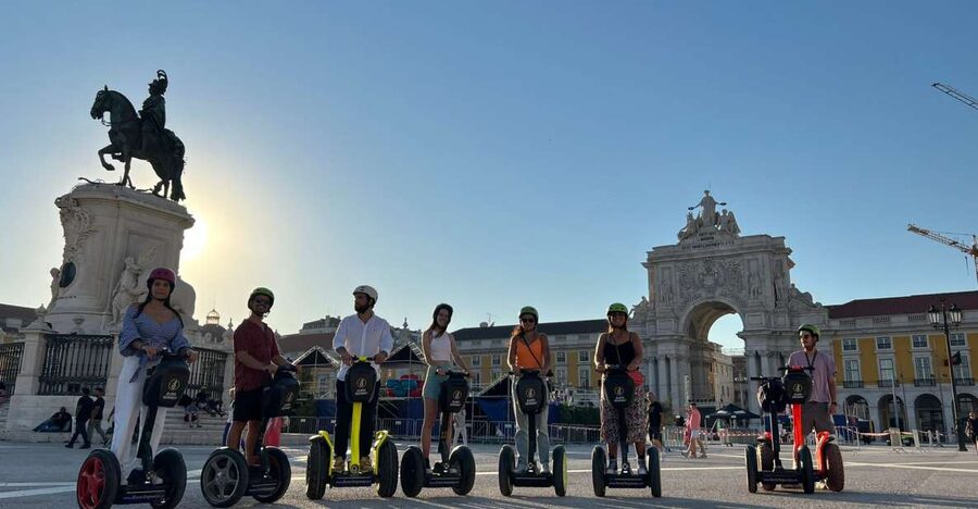 Lisbon: City Highlights Segway Tour - Downtown Lisbon on calçada: shops, cafés, and yellow trams