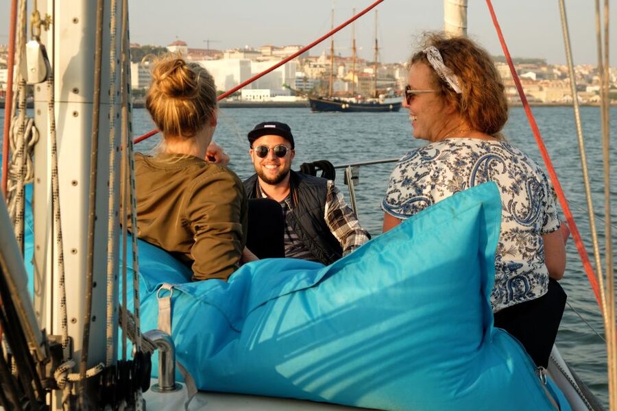 Lisbon: City Skyline Sailboat Cruise with Drink and Snacks - Cristo Rei and the south bank: the statue’s presence hits different