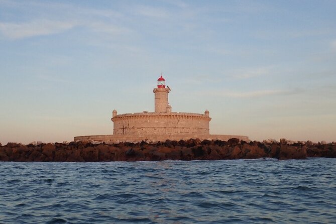 Lisbon Coast Tour by Boat - Discoveries Monument, 25 de Abril Bridge, and Cristo Rei up close