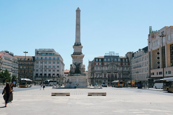 Lisbon Downtown Walking Tour by Professional Tour Guide- 3 Hours - Praca Dos Restauradores and the obelisk meaning