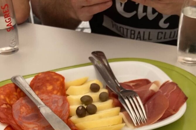 Lisbon E-Bike Guided Food Tour with Five Food Tastings - Stop 2: Alfama’s medieval lanes and the Santo António mood