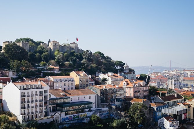 Lisbon E-Bike Tour Commerce Square, Mouraria and Alfama - Alfama lanes, June festivities, and Lisbon Cathedral in one connected loop