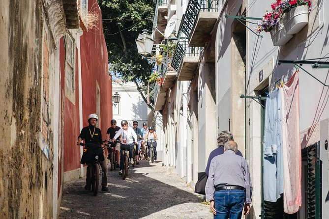 Lisbon E-Bike Tour Commerce Square, Mouraria and Alfama - Martim Moniz and Senhora do Monte: the Tagus shows up late on purpose