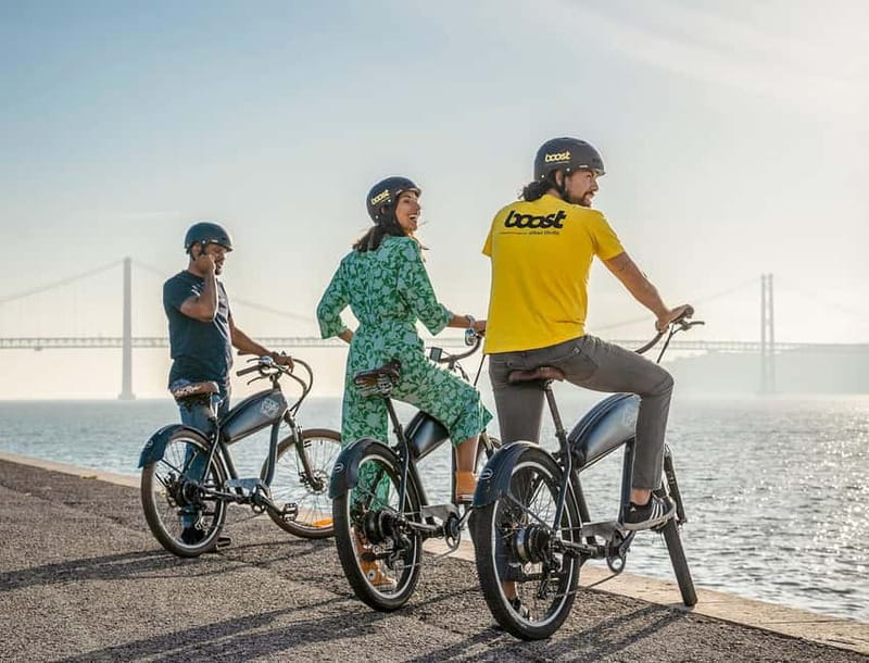 Lisbon: Electric Bike Tour by the River to Belém - Sliding under the 25 de Abril Bridge and getting the Alcântara dock views