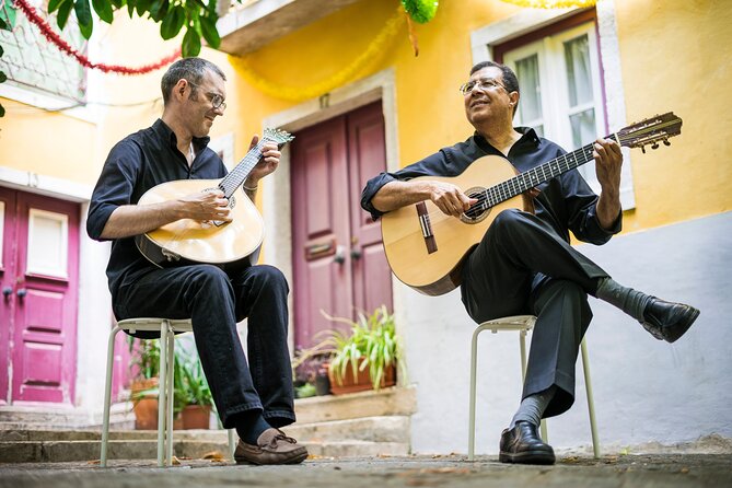 Lisbon Fado Dinner Show and Panoramic Night Tour - Alfama street time before dinner (where the vibe starts)