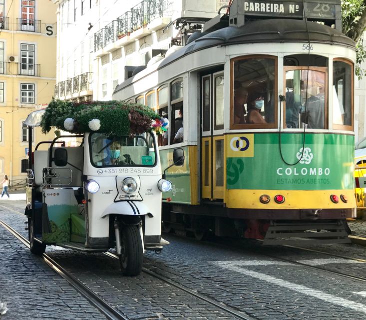 Lisbon: Famous 28 Tram Line Guided Private Tour by Tuk-Tuk - Price and value for a private group up to four