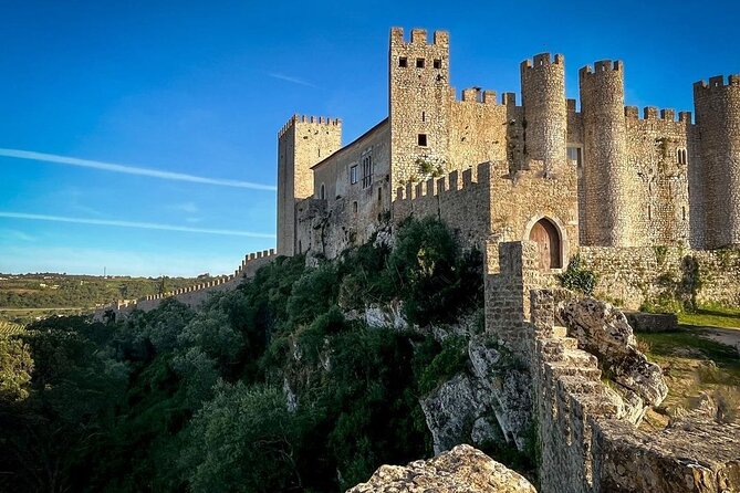 Lisbon: Fátima, Nazaré and Óbidos Full-Day Guided Tour - Nazaré’s Two Faces: Fishing Town and Big-Wave Theater