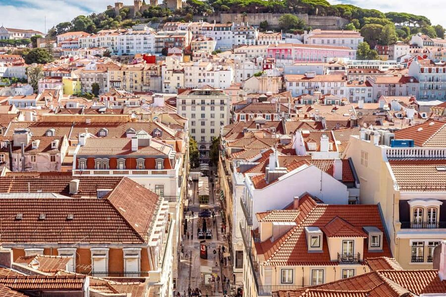 Lisbon: Flavors & Traditions Walking Food Tour - A Tendinha do Rossio and the Baixa walk: cured meats and street-level flavor