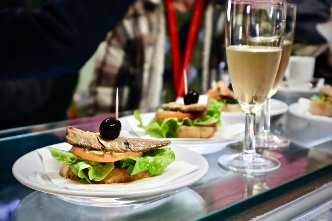 Lisbon Food Tour with 10+ Tastings of Local Delicacies & Wines - Porto wine, ginjinha, and Vinho Verde: the drink plan makes sense