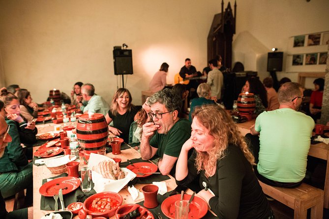 Lisbon Food Tour with 3 Stops and Fado Show Performance - Stop 2 in Alfama at the Mercearia shop: cheese, cold cuts, and petiscos basics