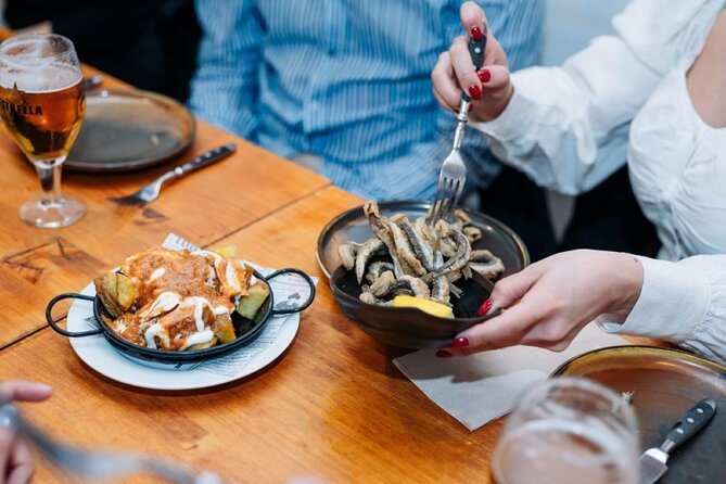 Lisbon Food Tour with Portuguese Wine: Taste the Best of Portugal - What you eat and drink: petiscos, vinho verde, and the sweet finish