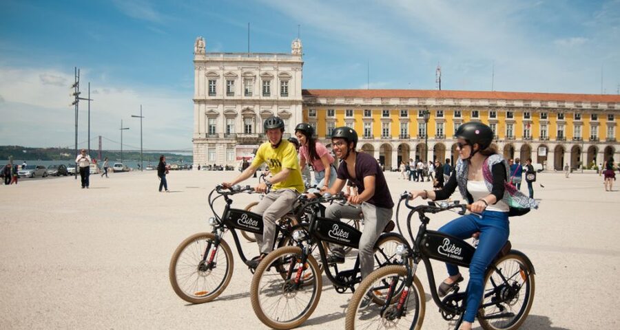 Lisbon: Hills, Alfama, and Mouraria Tour by Electric Bike - Commerce Square to the Fado Museum: easy momentum into Old Lisbon