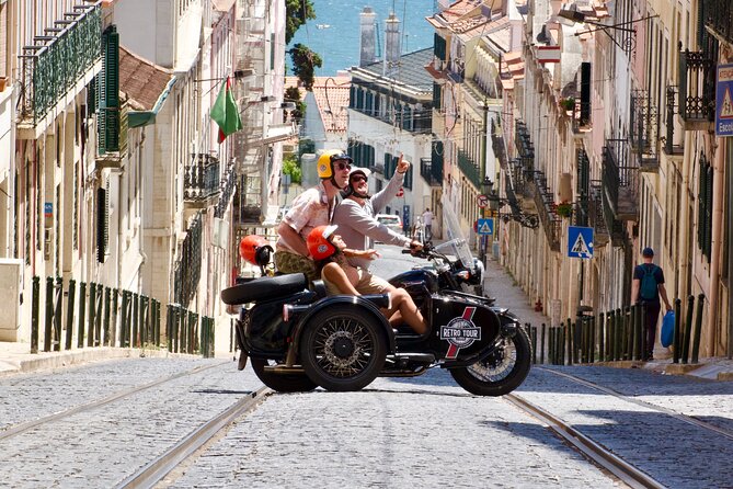 Lisbon Historic - Private Vintage Sidecar Tour - Liberty Avenue and Rossio: grand streets and April–May jacarandas