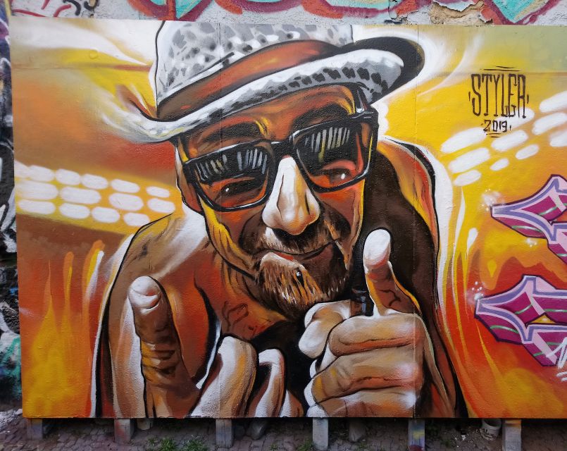 Lisbon: Kickstart Street Art Walking Tour - Hidden alleys and women-art wall energy