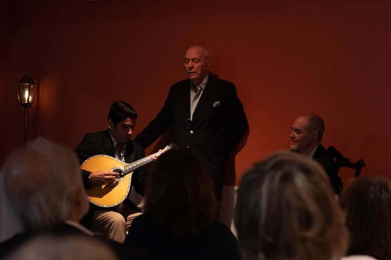 Lisbon: Live Fado Show with Port Wine at Lisboa em Fado - How the Portuguese Guitar and No-Mic Vocals Work Together