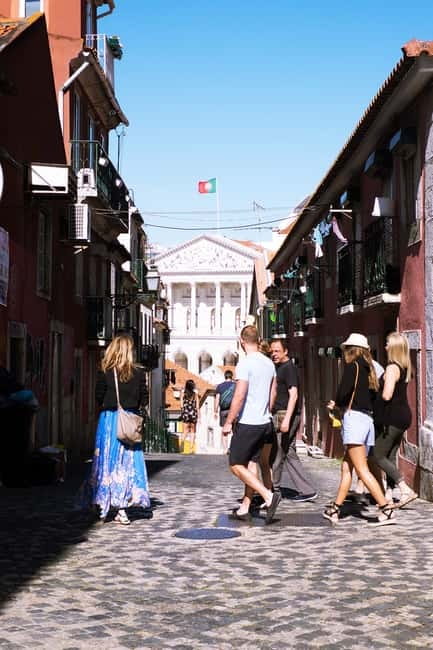 Lisbon: Off the beaten path Downtown Walk with a Local - Meet Humberto Bernardo Under the Iron-Frame Canopy Tree