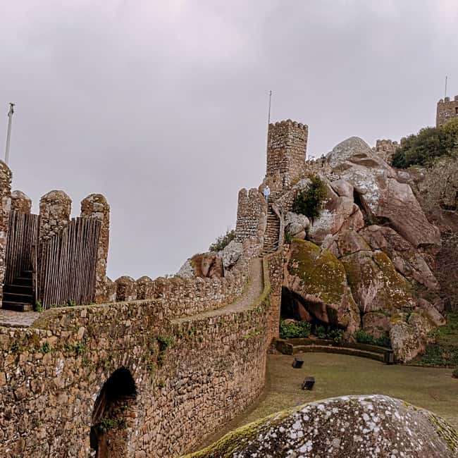 Lisbon: Pena Palace, Qta Regaleira, Moorish Castle & Cascais - Sintra town break: lunch, cobblestone wandering, and real atmosphere