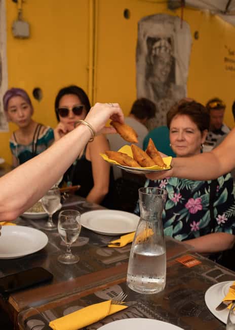Lisbon: Portuguese Cuisine Food Tour with 17 Tastings - Mouraria’s Long Tasting Stretch: Two Hours of Drinks, Petiscos, and Walking Culture
