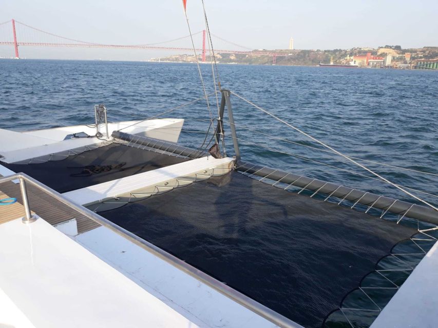 Lisbon: Private Catamaran Charter for up to 18-People - First Glide Downriver: From Belém Marina to Belém Tower