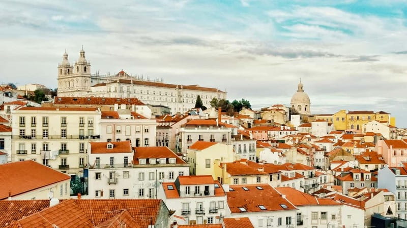 Lisbon: Private Guided Tuktuk Tour With History - Alfama side trips: flea market time and the Art on Tiles focus