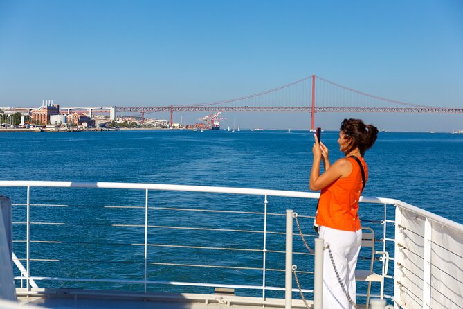 Lisbon River Boat Sightseeing Tour with a Drink - Christ the King, Almada, and the downhill-to-history feeling