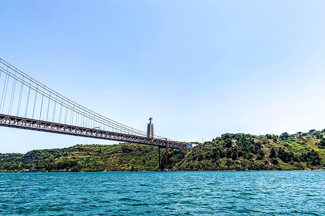 Lisbon Sailing Tour: 2-Hour Cultural Scenic Cruise with Wine - 25th of April Bridge and Belém Tower: Big Landmarks, Calm Delivery