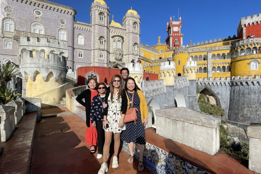 Lisbon: Sintra, Cascais, & Estoril Guided Day Tour - Pena Palace in the Sintra Mountains: romantic architecture and terrace payoff