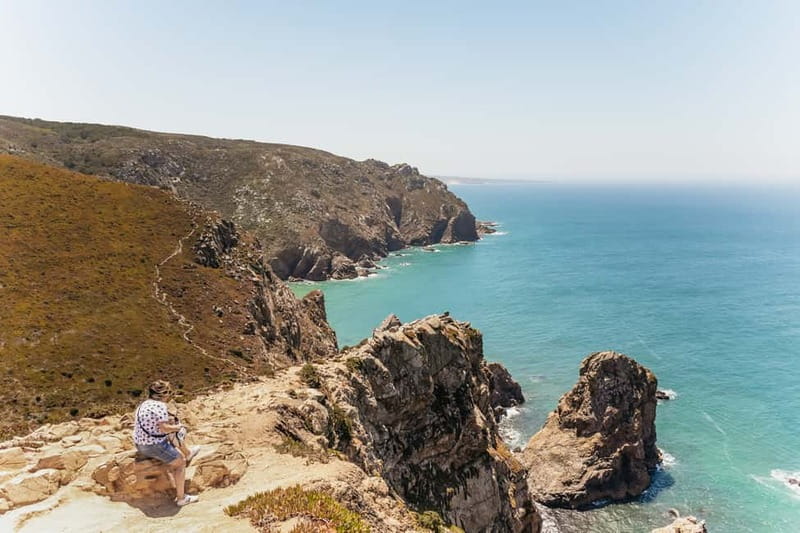 Lisbon: Sintra, Pena, Cabo da Roca, Cascais Tour with Pickup - The Portuguese West Coast: Guincho Beach Pass-By and the Cabo da Roca Moment