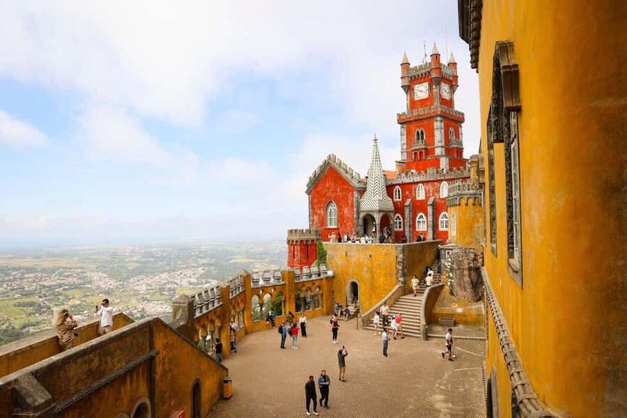 Lisbon: Sintra, Pena Palace, Belém Tour + sunset Boat Cruise - Pena Palace in Sintra: terraces, views, and stories you can actually follow