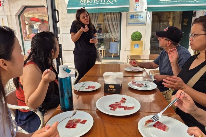 Lisbon Small-Group Food Tour: Eat & Drink Like a Local - Seafood rice with lobster and Bacalhau à Brás: Lisbon on one plate