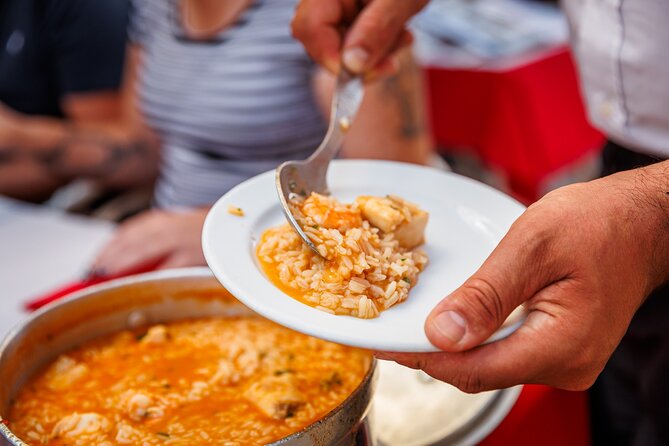 Lisbon Small-Group Portuguese Food and Wine Tour - What you’ll actually taste: cod, port, cheese, chouriço, rice, and petiscos-style bites