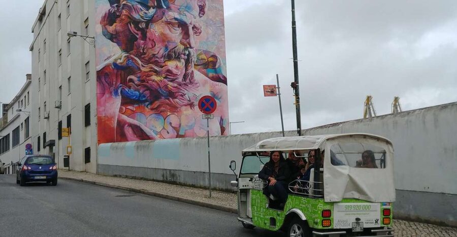 Lisbon Street Art by Tuk Tuk : Graffiti & Murals Discovery - The electric tuk-tuk setup: rain-friendly views and easy listening