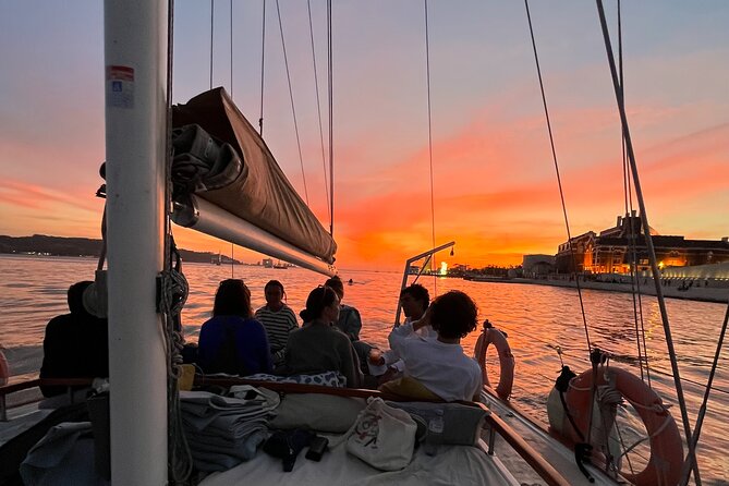 Lisbon Sunset Boat Cruise Tour With Drinks Included - Almada and the best river-to-river photo moment: bridges and Christ