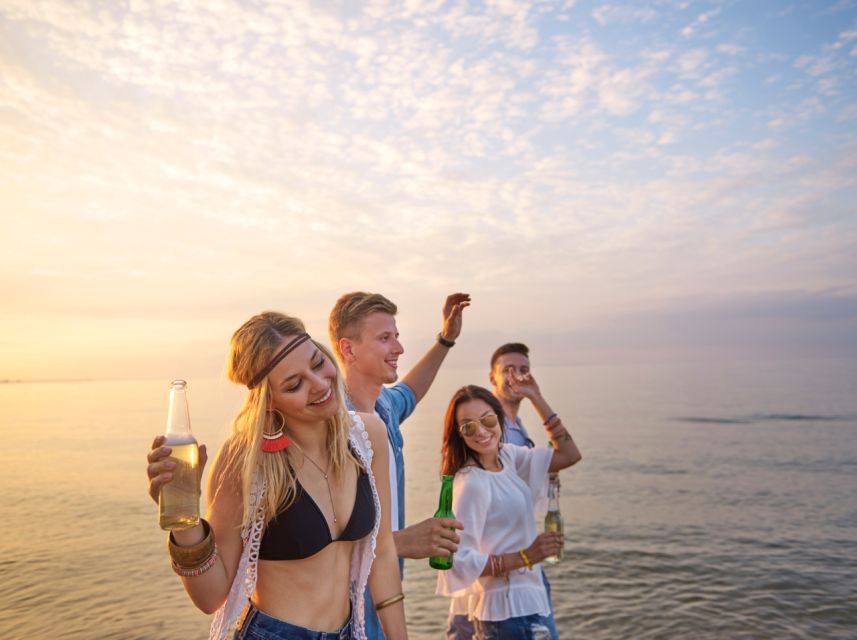 Lisbon: Sunset Boat Party Cruise with DJ and Open Bar - Staff energy: the crew’s role in making it smooth