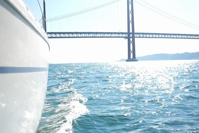 Lisbon Sunset Boat Tour Wines Included - Conversation with the skipper and co-skipper: learning without lectures