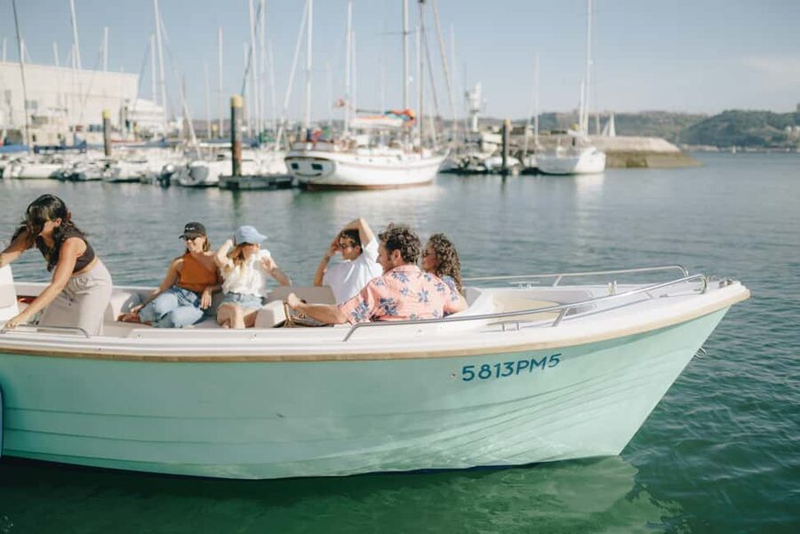 Lisbon Sunset Boat Tour with local Snacks & Drinks - Snacks and green wine: the best part of the “floating break”