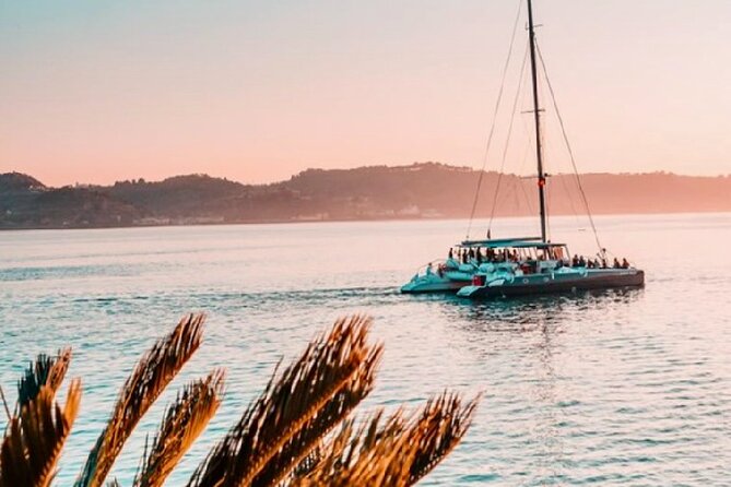 Lisbon: Sunset Catamaran Boat Tour with Music and Drinks - Nets and the covered terrace: where to sit for the best views