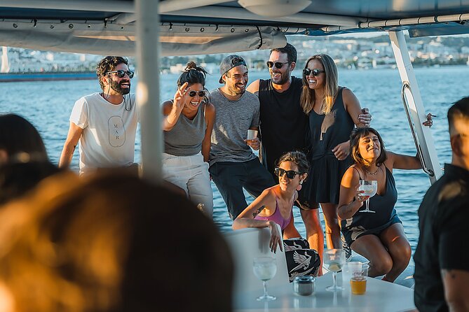 Lisbon: Sunset Catamaran Boat Tour with Music and Drinks - A quick route from Cristo Rei to Belém and back
