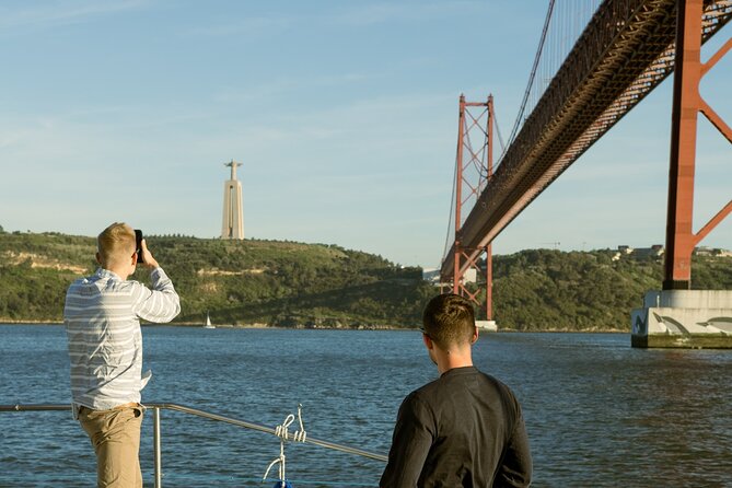 Lisbon: Sunset Catamaran Boat Tour with Music and Drinks - The welcome cocktail, blankets, and crew-chosen music vibe