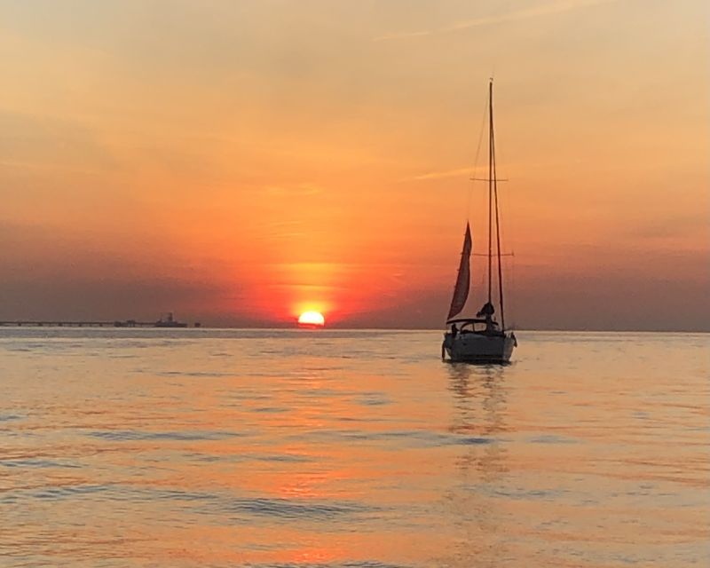 Lisbon: Sunset Cruise with Drinks - A 2-hour Lisbon sunset cruise that feels calm, not chaotic