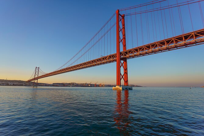 Lisbon Sunset Cruise with Wine and Snacks - Sundeck strategy: how to get the best sunset photos