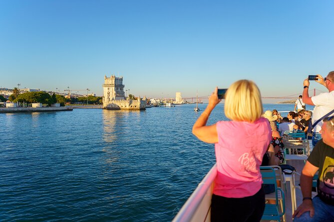 Lisbon Sunset Cruise with Wine and Snacks - Getting comfortable on board: seating, windows, and waits